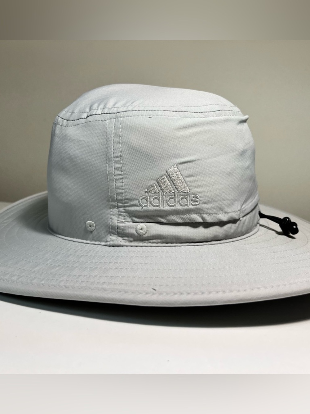 Adidas Light Gray Bucket Hat with adjustable chin strap